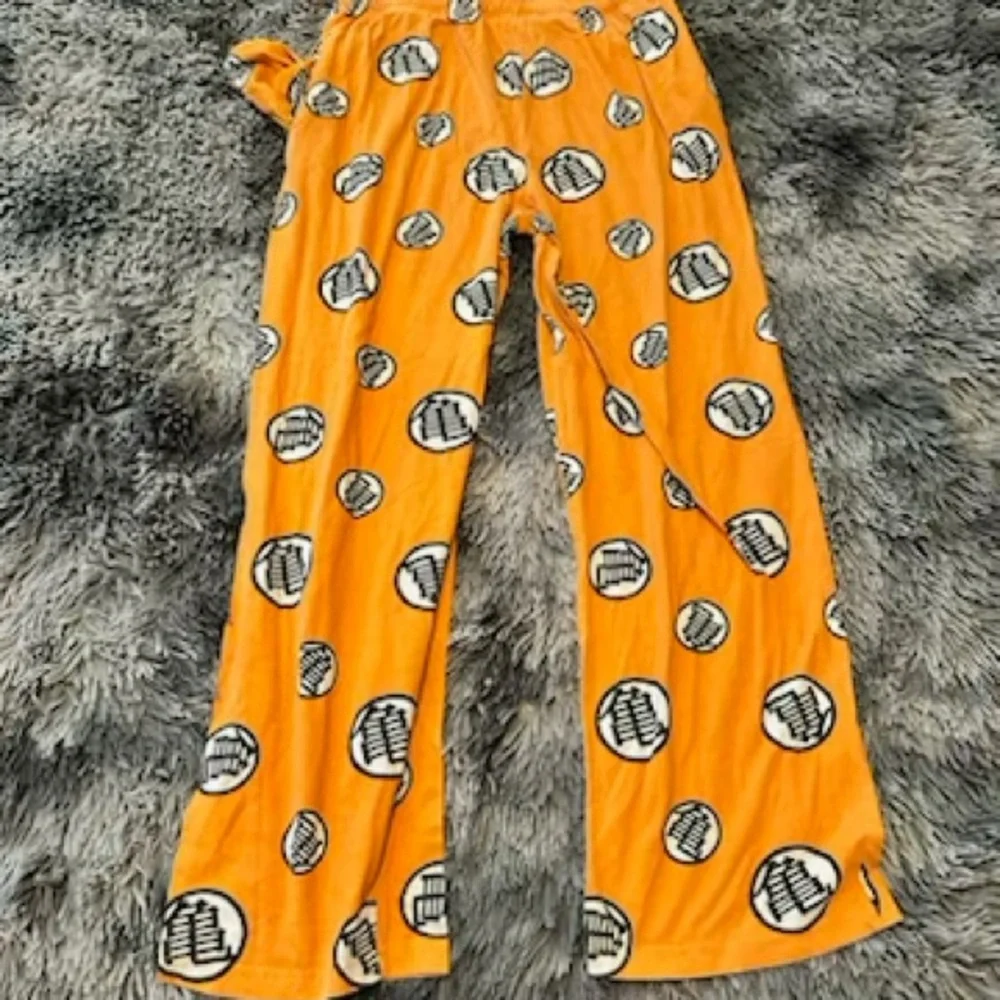 Men’s Dragonball Z Vibrant Orange Pajama Bottoms with Fun Print